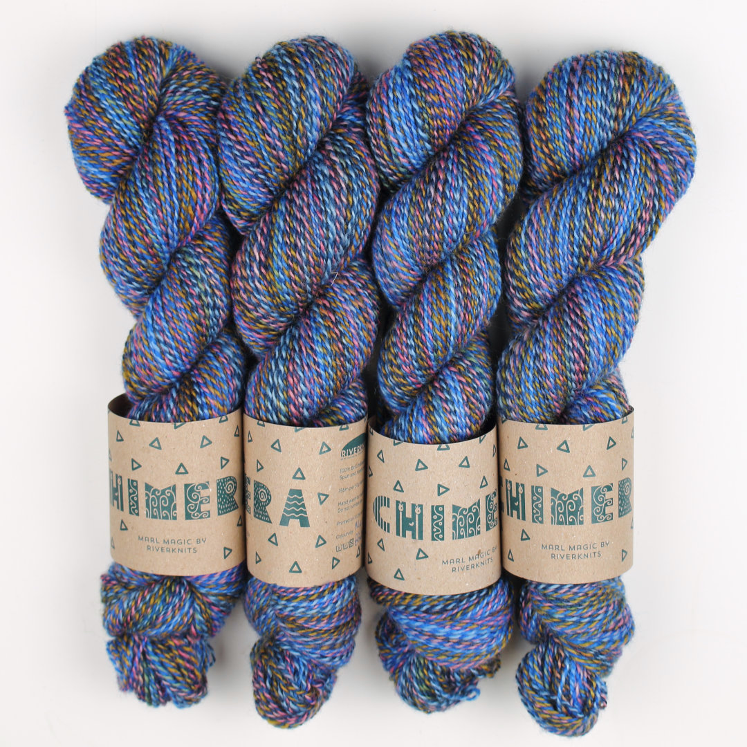 Bright blue marled skeins of Chimera