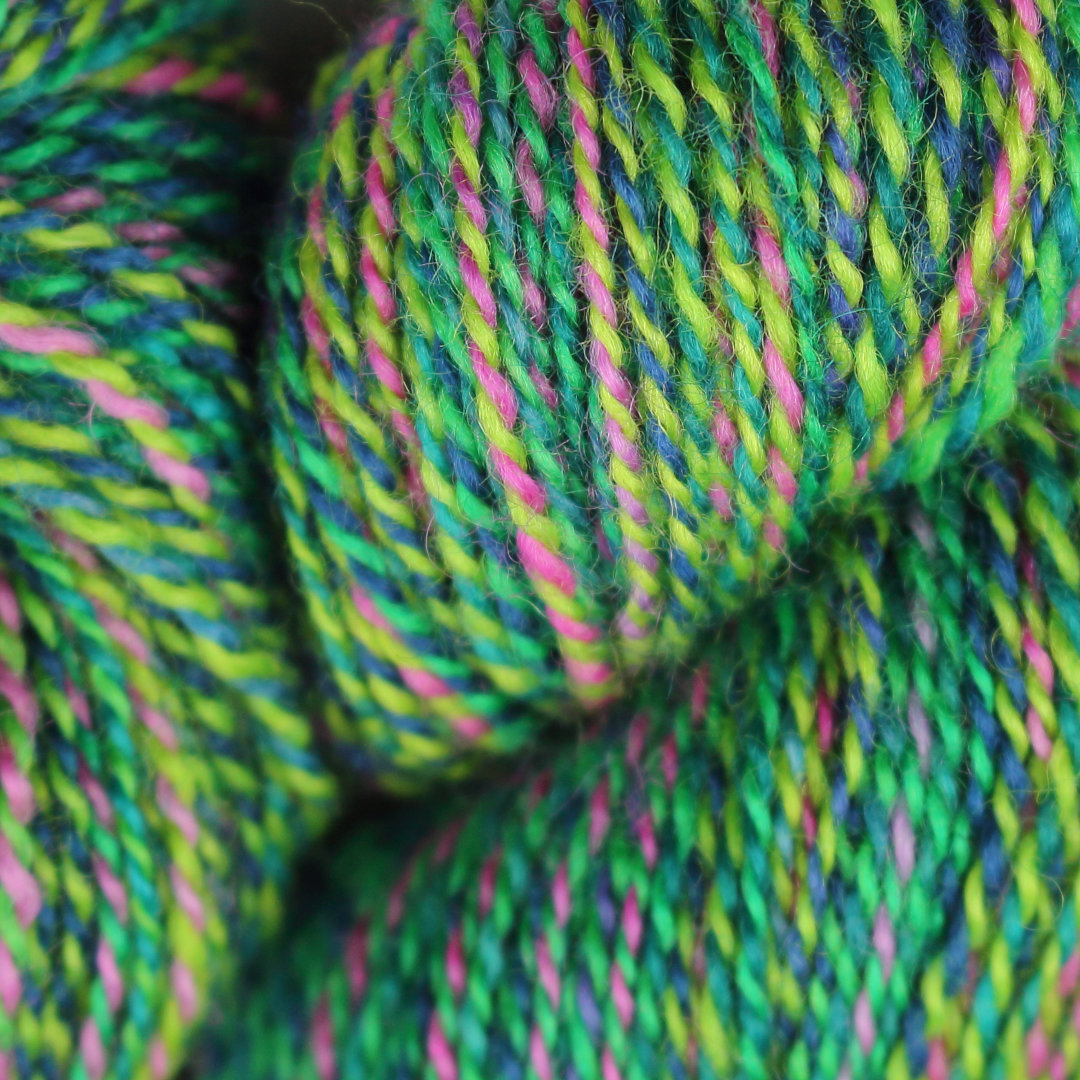 Bright green marled skeins of Chimera