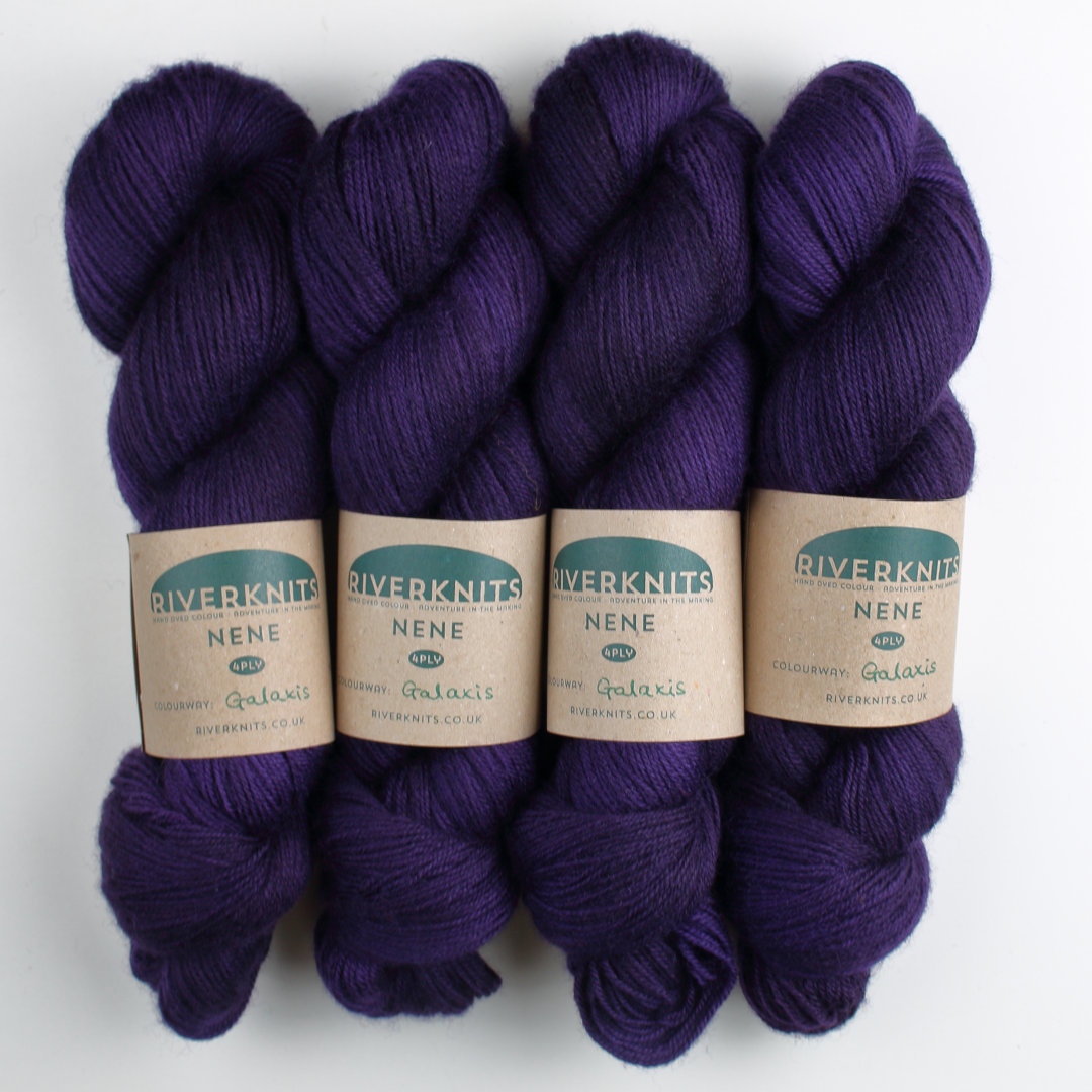 Skeins of the deepest darkest purple Nene 4 Ply