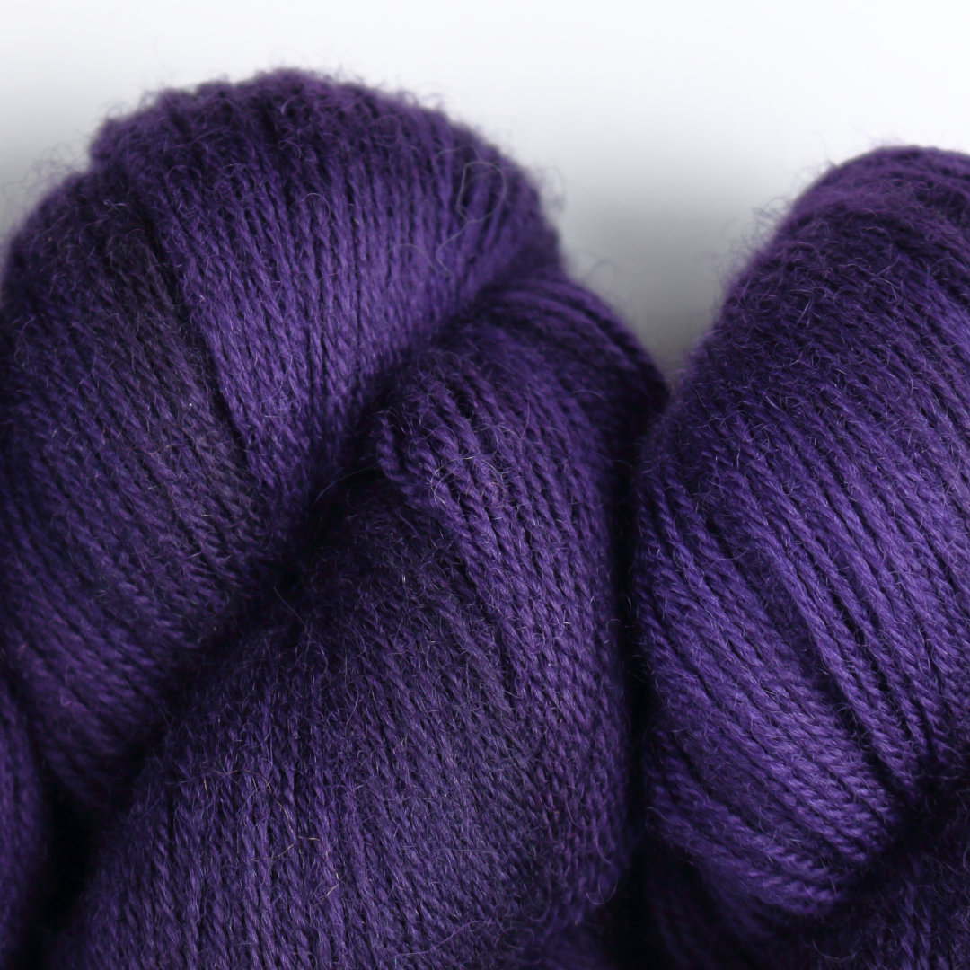 Skeins of the deepest darkest purple Nene 4 Ply