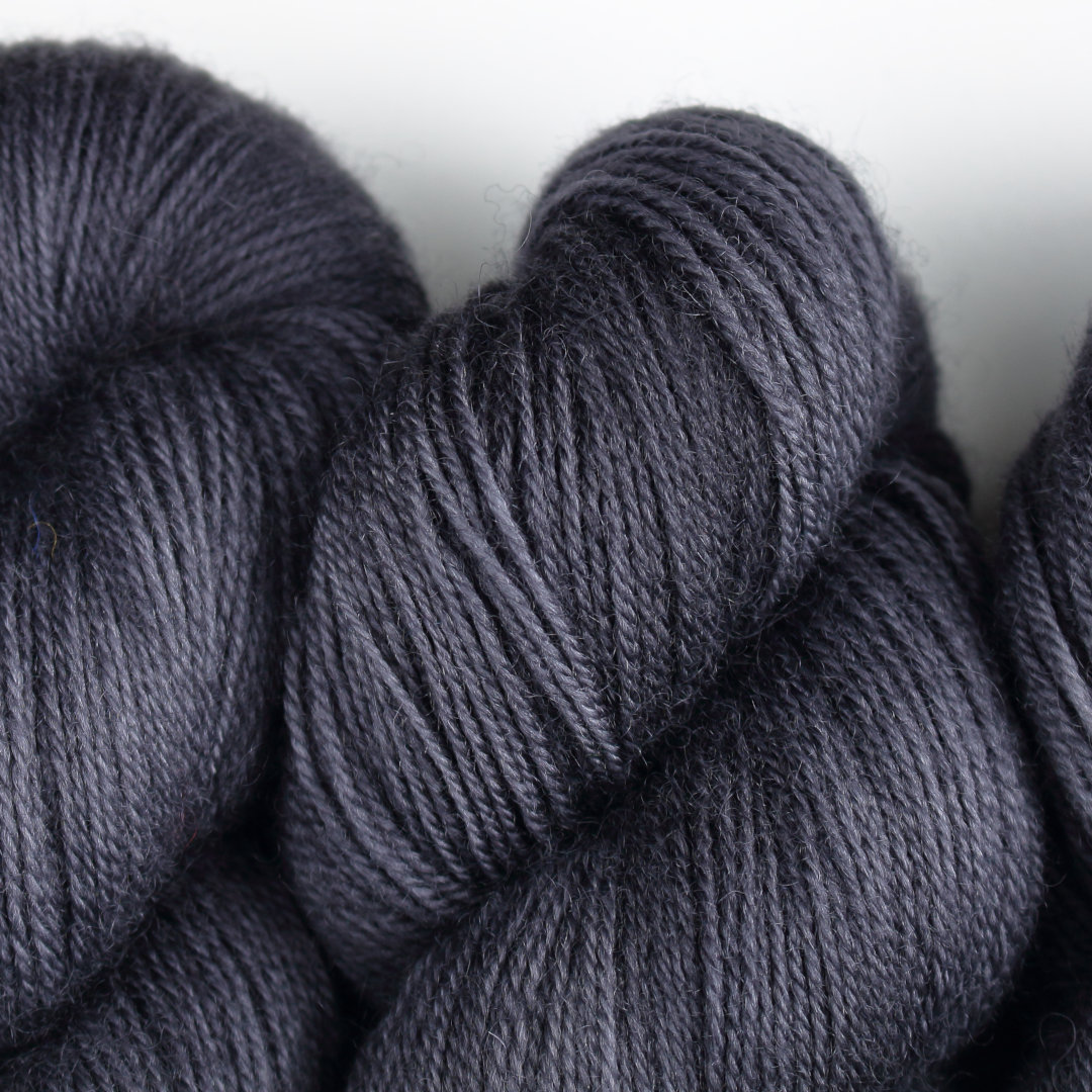 Darkest charcoal grey skeins of Nene 4 Ply