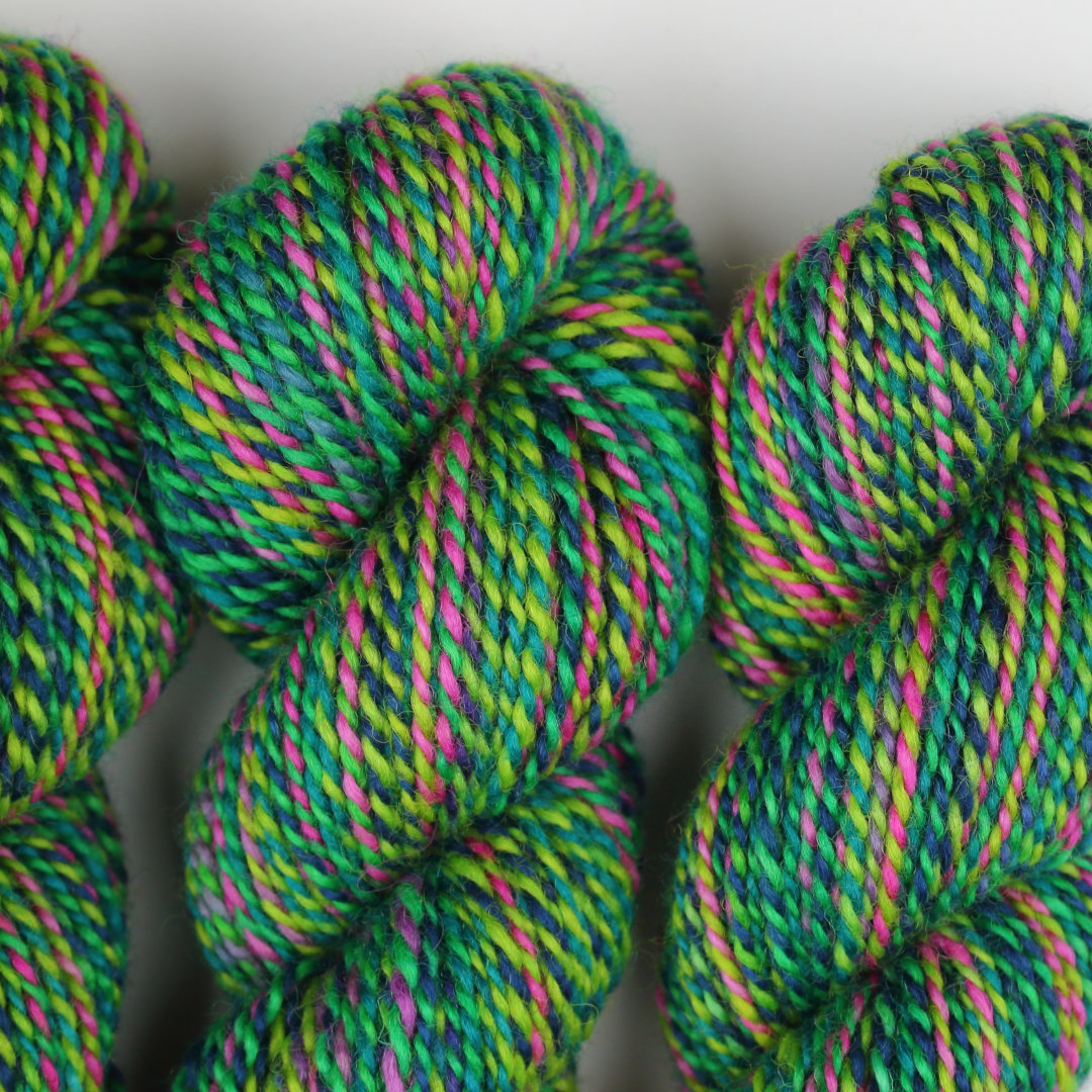 Bright green marled skeins of Chimera